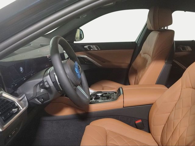 BMW X6 xDrive30d color Negro. Año 2023. 210KW(286CV). Diésel. En concesionario San Pablo Motor | Ctra. Amarilla SE-30 de Sevilla