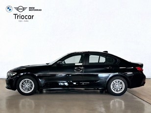 Fotos de BMW Serie 3 318d color Negro. Año 2019. 110KW(150CV). Diésel. En concesionario Triocar Gijón (Bmw y Mini) de Asturias