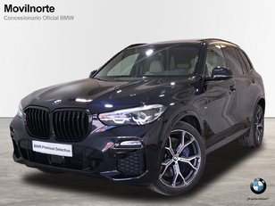 Fotos de BMW X5 xDrive45e color Negro. Año 2021. 290KW(394CV). Híbrido Electro/Gasolina. En concesionario Movilnorte El Carralero de Madrid