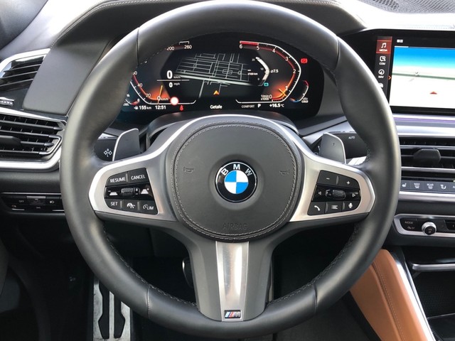 BMW X6 xDrive30d color Negro. Año 2023. 210KW(286CV). Diésel. En concesionario Vehinter Getafe de Madrid