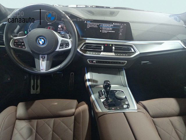 BMW X5 xDrive45e color Azul. Año 2022. 290KW(394CV). Híbrido Electro/Gasolina. En concesionario CANAAUTO - TACO de Sta. C. Tenerife