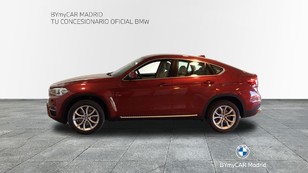 Fotos de BMW X6 xDrive35i color Rojo. Año 2015. 225KW(306CV). Gasolina. En concesionario BYmyCAR Madrid - Alcalá de Madrid