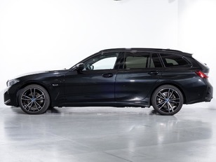 Fotos de BMW Serie 3 330e Touring color Negro. Año 2023. 215KW(292CV). Híbrido Electro/Gasolina. En concesionario Oliva Motor Girona de Girona