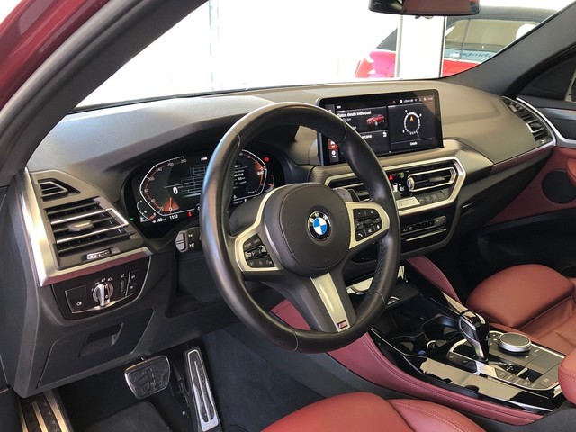 BMW X4 xDrive20d color Rojo. Año 2023. 140KW(190CV). Diésel. En concesionario Vehinter Getafe de Madrid
