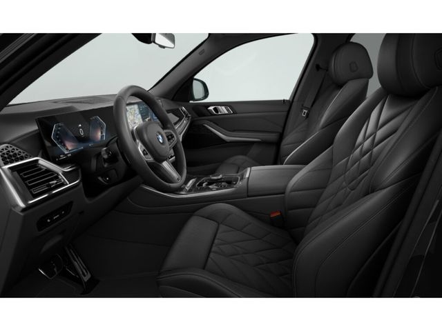 BMW X5 xDrive30d color Negro. Año 2023. 219KW(298CV). Diésel. En concesionario Momentum S.A. de Madrid