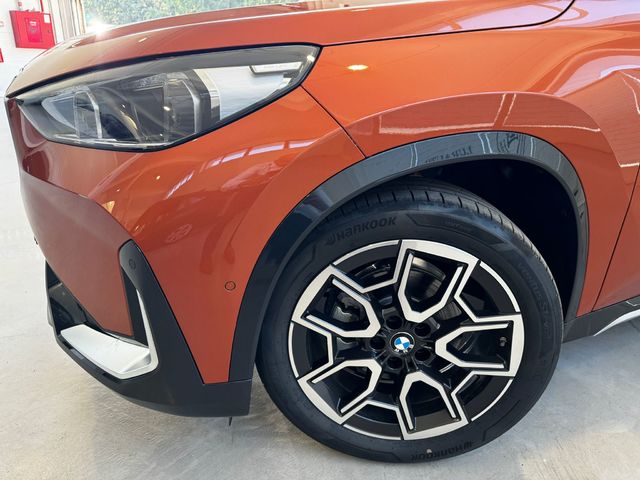 BMW X1 sDrive18d color Naranja. Año 2024. 110KW(150CV). Diésel. En concesionario Lurauto - Gipuzkoa de Guipuzcoa