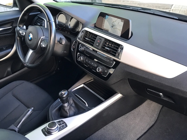 BMW Serie 1 116d color Negro. Año 2019. 85KW(116CV). Diésel. En concesionario Celtamotor Vigo  de Pontevedra