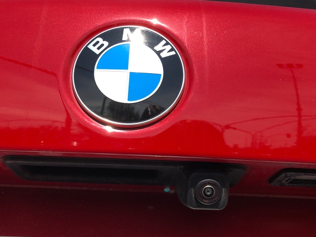 BMW Serie 1 118d color Rojo. Año 2023. 110KW(150CV). Diésel. En concesionario Auto Premier, S.A. - MADRID de Madrid