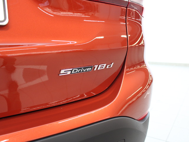 BMW X1 sDrive18d color Naranja. Año 2020. 110KW(150CV). Diésel. En concesionario Augusta Aragon S.A. de Zaragoza