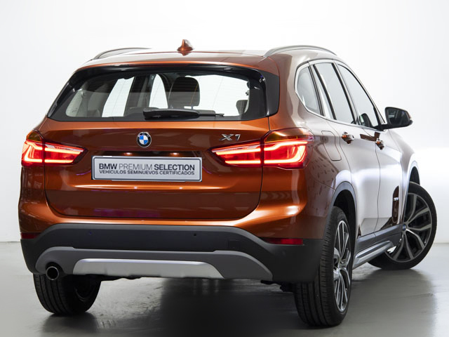 BMW X1 sDrive18d color Naranja. Año 2018. 110KW(150CV). Diésel. En concesionario Fuenteolid de Valladolid