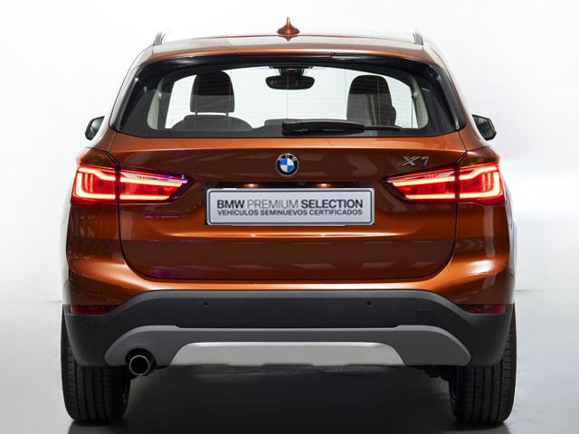 BMW X1 sDrive18d color Naranja. Año 2018. 110KW(150CV). Diésel. En concesionario Fuenteolid de Valladolid