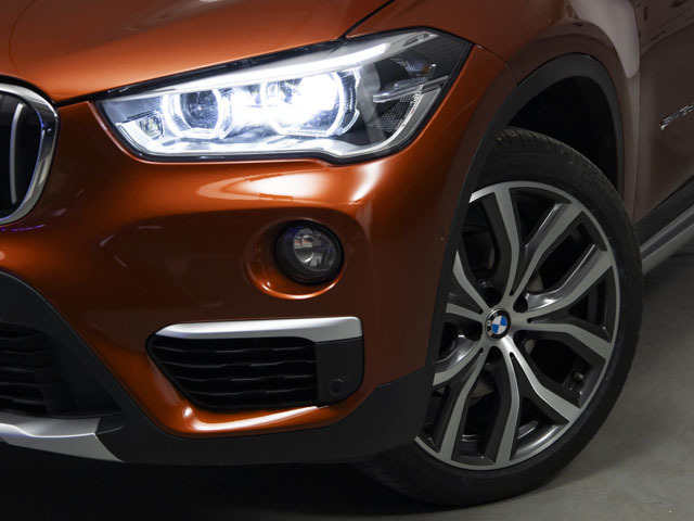 BMW X1 sDrive18d color Naranja. Año 2018. 110KW(150CV). Diésel. En concesionario Fuenteolid de Valladolid