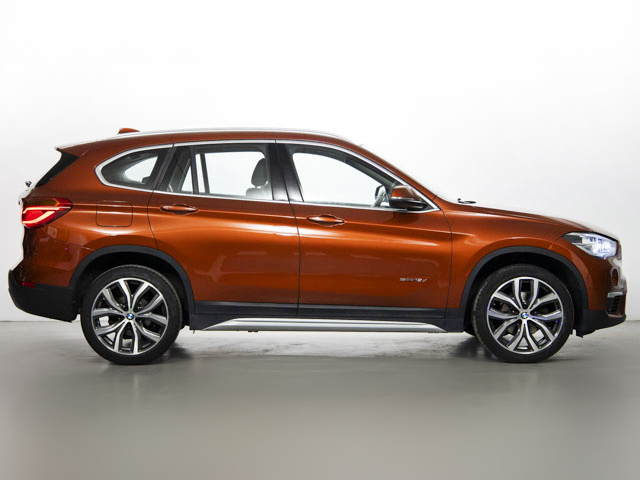 BMW X1 sDrive18d color Naranja. Año 2018. 110KW(150CV). Diésel. En concesionario Fuenteolid de Valladolid