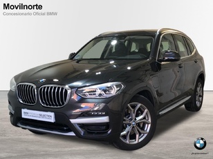 Fotos de BMW X3 xDrive30e color Gris. Año 2021. 215KW(292CV). Híbrido Electro/Gasolina. En concesionario Movilnorte El Plantio de Madrid