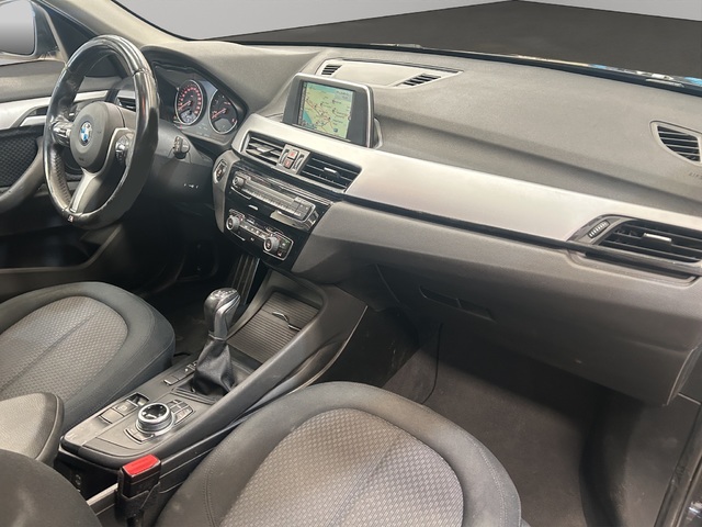 BMW X1 sDrive18d color Negro. Año 2017. 110KW(150CV). Diésel. En concesionario GANDIA Automoviles Fersan, S.A. de Valencia