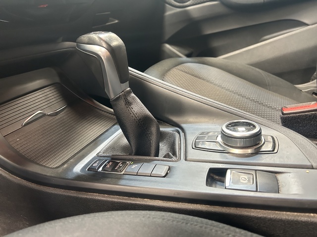 BMW X1 sDrive18d color Negro. Año 2017. 110KW(150CV). Diésel. En concesionario GANDIA Automoviles Fersan, S.A. de Valencia