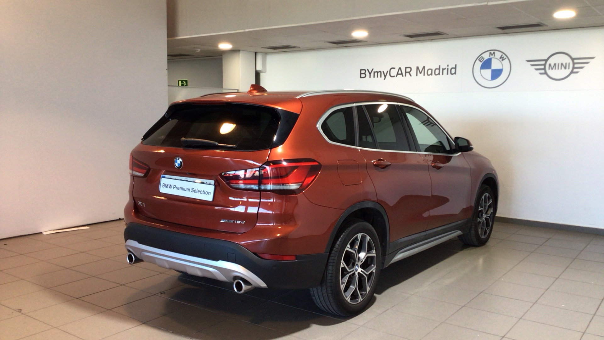 BMW X1 sDrive18d color Naranja. Año 2020. 110KW(150CV). Diésel. En concesionario BYmyCAR Madrid - Alcalá de Madrid