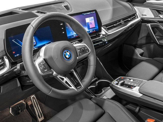 BMW iX1 eDrive20 color Azul. Año 2025. 150KW(204CV). Eléctrico. En concesionario Caetano Cuzco, Alcalá de Madrid