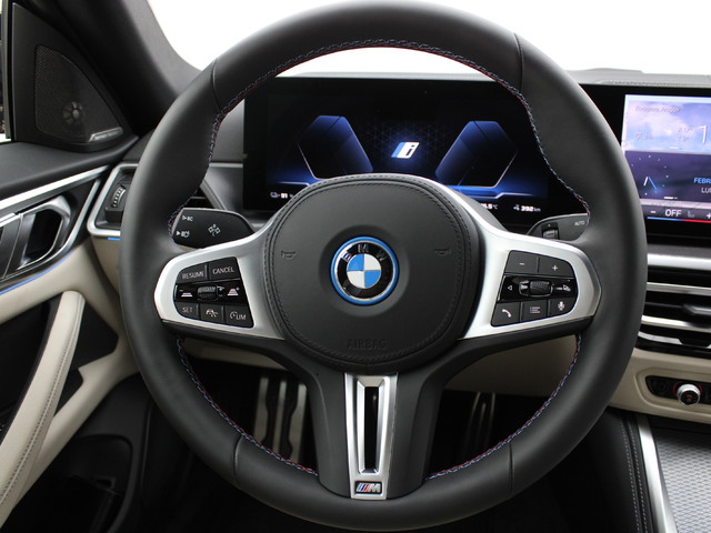 BMW i4 M50 color Azul. Año 2025. 400KW(544CV). Eléctrico. En concesionario Augusta Aragon S.A. de Zaragoza