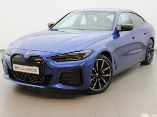 Fotos de BMW i4 M50 color Azul. Año 2025. 400KW(544CV). Eléctrico. En concesionario Augusta Aragon S.A. de Zaragoza
