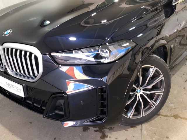 BMW X5 xDrive30d color Negro. Año 2024. 219KW(298CV). Diésel. En concesionario Movilnorte El Carralero de Madrid