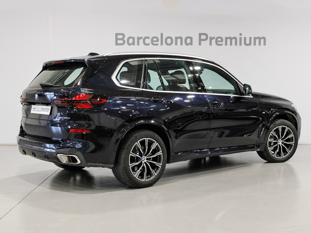 BMW X5 xDrive30d color Negro. Año 2024. 219KW(298CV). Diésel. En concesionario Barcelona Premium -- GRAN VIA de Barcelona