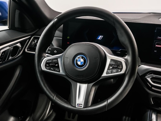 BMW i4 eDrive40 color Azul. Año 2024. 250KW(340CV). Eléctrico. En concesionario Oliva Motor Tarragona de Tarragona