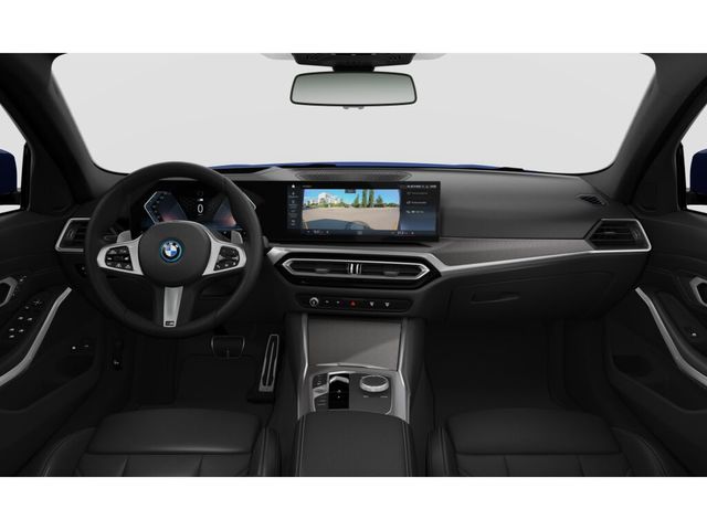 BMW Serie 3 330e Touring color Azul. Año 2024. 215KW(292CV). Híbrido Electro/Gasolina. En concesionario Movilnorte El Plantio de Madrid