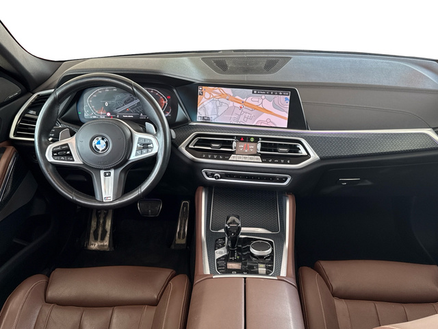 BMW X6 xDrive30d color Marrón. Año 2021. 210KW(286CV). Diésel. En concesionario Auto Premier, S.A. - MADRID de Madrid