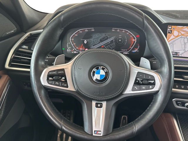 BMW X6 xDrive30d color Marrón. Año 2021. 210KW(286CV). Diésel. En concesionario Auto Premier, S.A. - MADRID de Madrid
