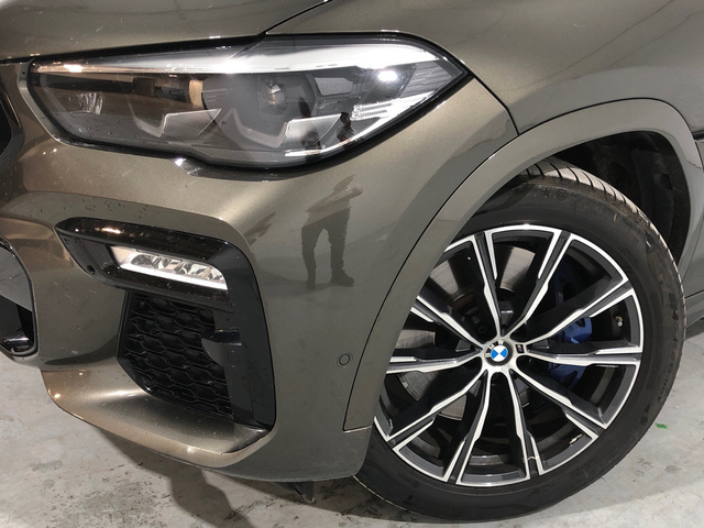 BMW X6 xDrive40d color Marrón. Año 2021. 250KW(340CV). Diésel. En concesionario Auto Premier, S.A. - MADRID de Madrid