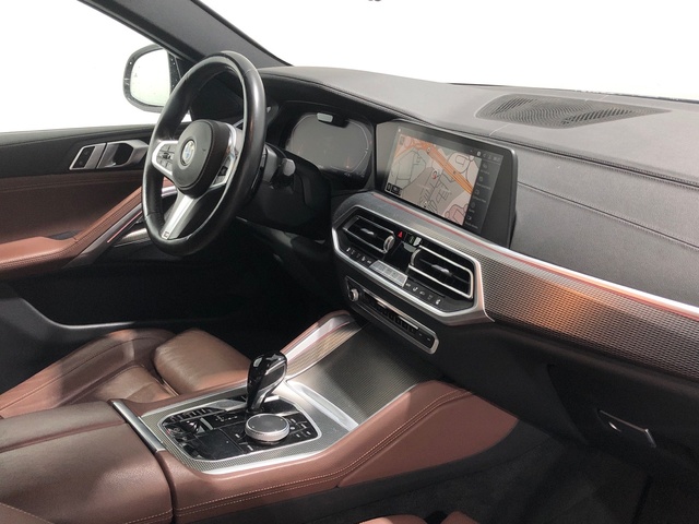 BMW X6 xDrive40d color Marrón. Año 2021. 250KW(340CV). Diésel. En concesionario Auto Premier, S.A. - MADRID de Madrid