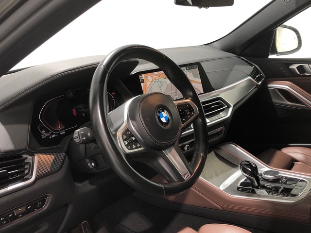 BMW X6 xDrive40d color Marrón. Año 2021. 250KW(340CV). Diésel. En concesionario Auto Premier, S.A. - MADRID de Madrid