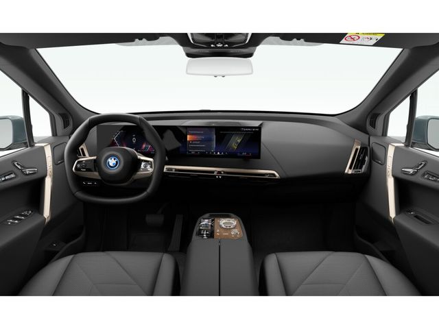BMW iX xDrive50 color Gris. Año 2024. 385KW(523CV). Eléctrico. En concesionario Movilnorte El Plantio de Madrid