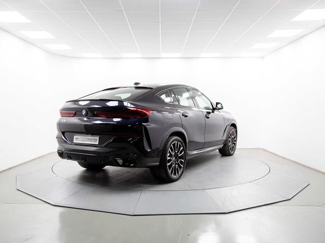 BMW X6 xDrive30d color Negro. Año 2023. 210KW(286CV). Diésel. En concesionario Móvil Begar Alicante de Alicante