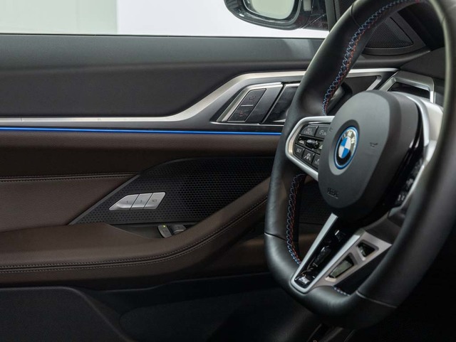 BMW i4 M50 color Rojo. Año 2024. 400KW(544CV). Eléctrico. En concesionario Oliva Motor Girona de Girona