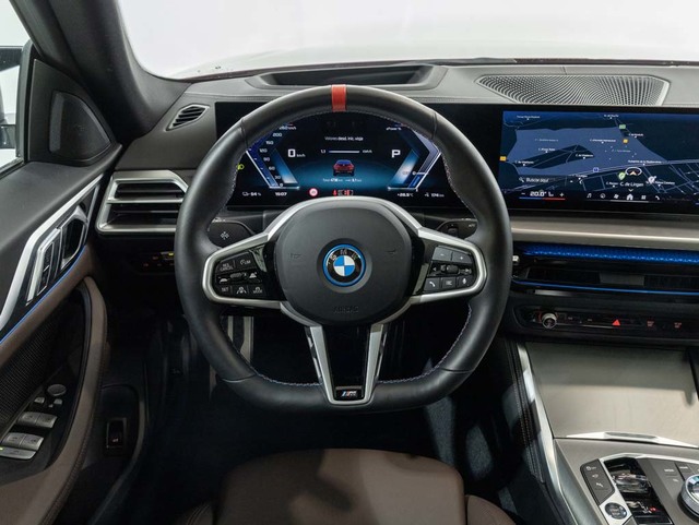 BMW i4 M50 color Rojo. Año 2024. 400KW(544CV). Eléctrico. En concesionario Oliva Motor Girona de Girona