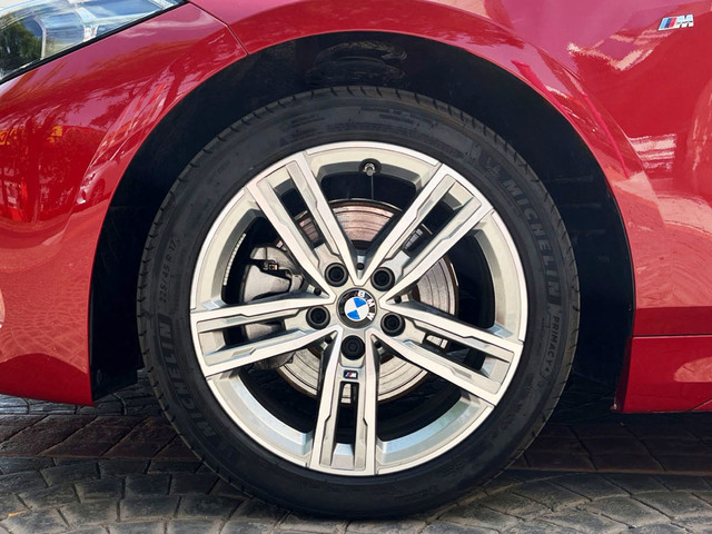 BMW Serie 1 118i color Rojo. Año 2024. 103KW(140CV). Gasolina. En concesionario Murcia Premium S.L. AV DEL ROCIO de Murcia