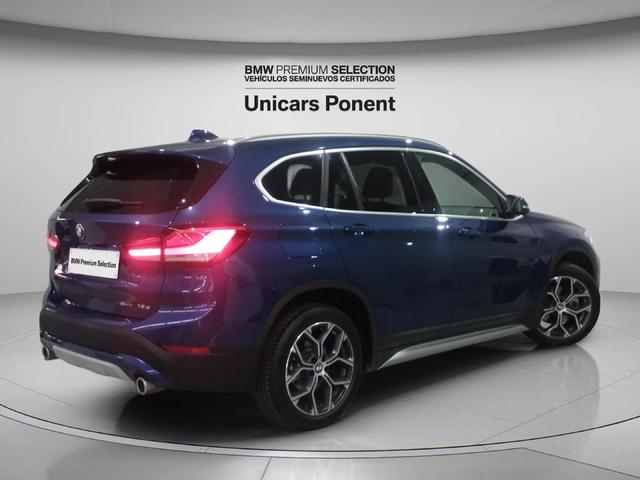 BMW X1 sDrive18d color Naranja. Año 2021. 110KW(150CV). Diésel. En concesionario Unicars Ponent de Lleida