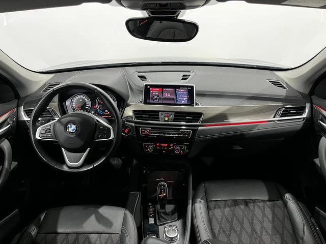 BMW X1 sDrive18d color Naranja. Año 2021. 110KW(150CV). Diésel. En concesionario Unicars Ponent de Lleida