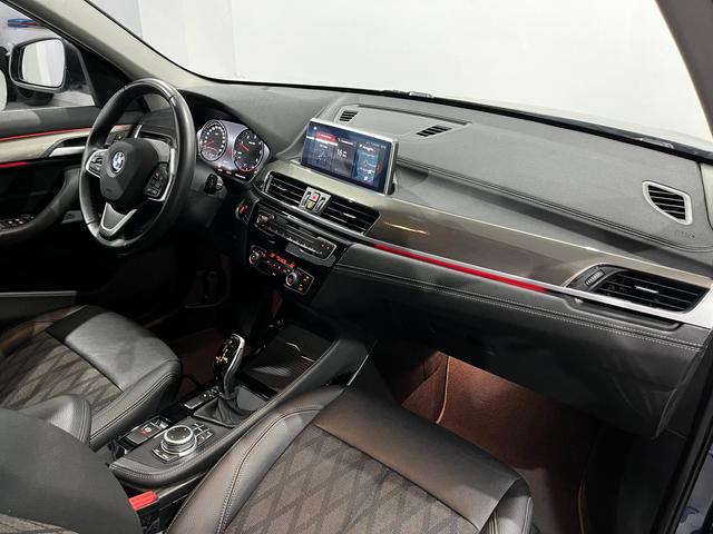 BMW X1 sDrive18d color Naranja. Año 2021. 110KW(150CV). Diésel. En concesionario Unicars Ponent de Lleida