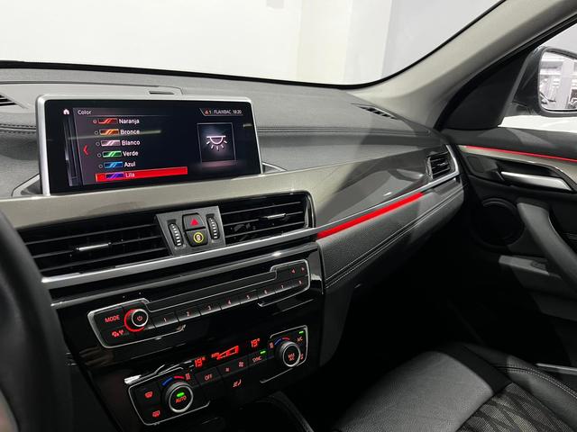 BMW X1 sDrive18d color Naranja. Año 2021. 110KW(150CV). Diésel. En concesionario Unicars Ponent de Lleida