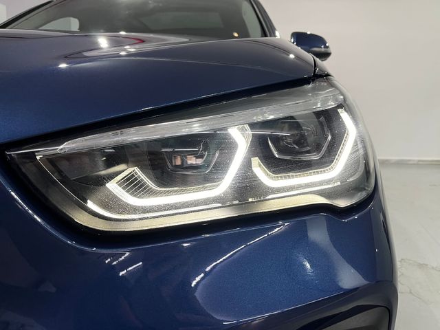BMW X1 sDrive18d color Naranja. Año 2021. 110KW(150CV). Diésel. En concesionario Unicars Ponent de Lleida