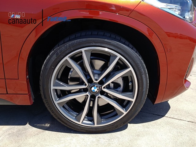 BMW X2 xDrive25e color Naranja. Año 2021. 162KW(220CV). Híbrido Electro/Gasolina. En concesionario LAS CHAFIRAS de Sta. C. Tenerife