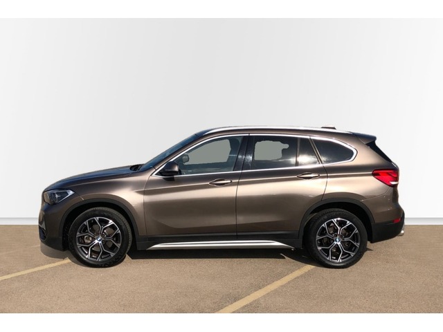 BMW X1 sDrive18i color Beige. Año 2021. 103KW(140CV). Gasolina. En concesionario Proa Premium Palma de Baleares