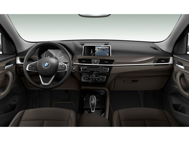BMW X1 sDrive20i color Beige. Año 2021. 141KW(192CV). Gasolina. En concesionario Caetano Cuzco, Alcalá de Madrid