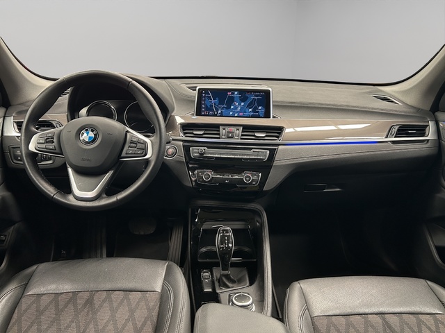 BMW X1 sDrive18d color Negro. Año 2021. 110KW(150CV). Diésel. En concesionario GANDIA Automoviles Fersan, S.A. de Valencia