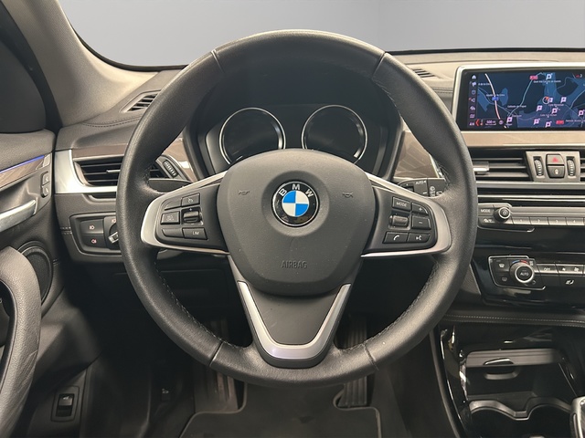 BMW X1 sDrive18d color Negro. Año 2021. 110KW(150CV). Diésel. En concesionario GANDIA Automoviles Fersan, S.A. de Valencia