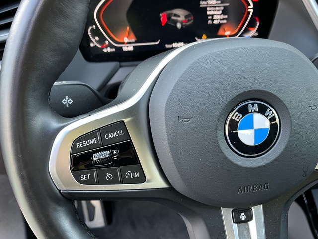 BMW Serie 1 118i color Rojo. Año 2024. 103KW(140CV). Gasolina. En concesionario Celtamotor Vigo de Pontevedra