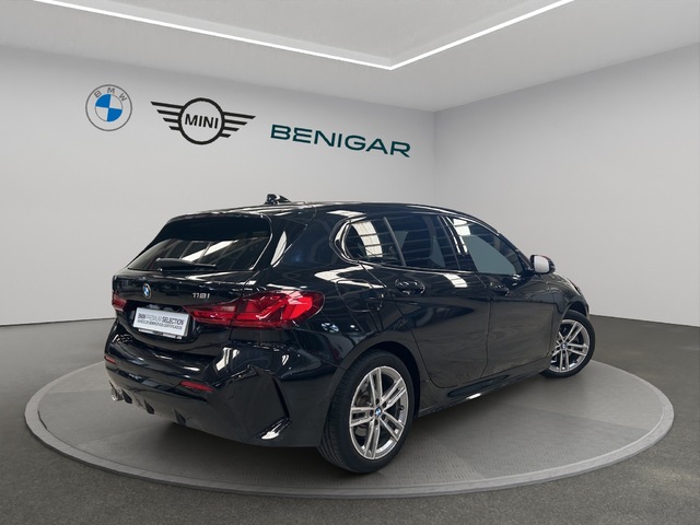 BMW Serie 1 118i color Negro. Año 2021. 103KW(140CV). Gasolina. En concesionario GANDIA Automoviles Fersan, S.A. de Valencia